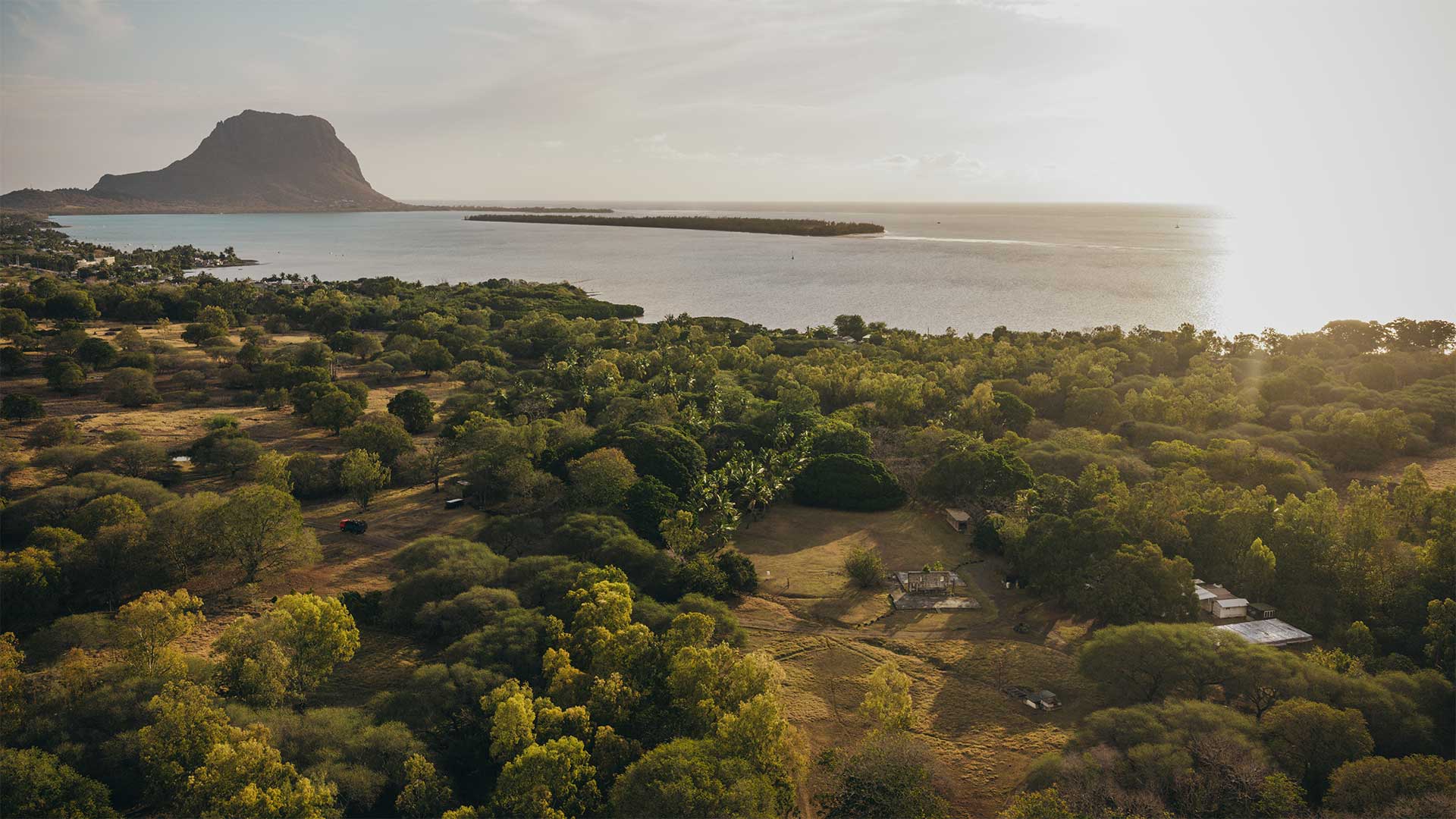 Aerial view of Case Noyale with Le Morne Brabant in the background